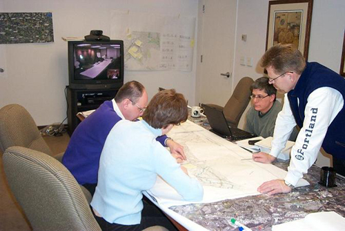 Figure 4: Road safety audit team reviewing roadway plans